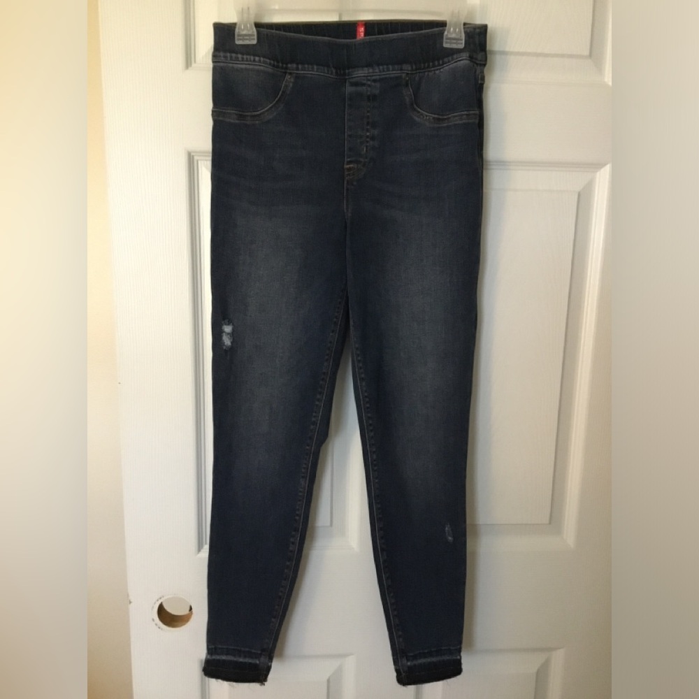 Spanx skinny distressed jeans.